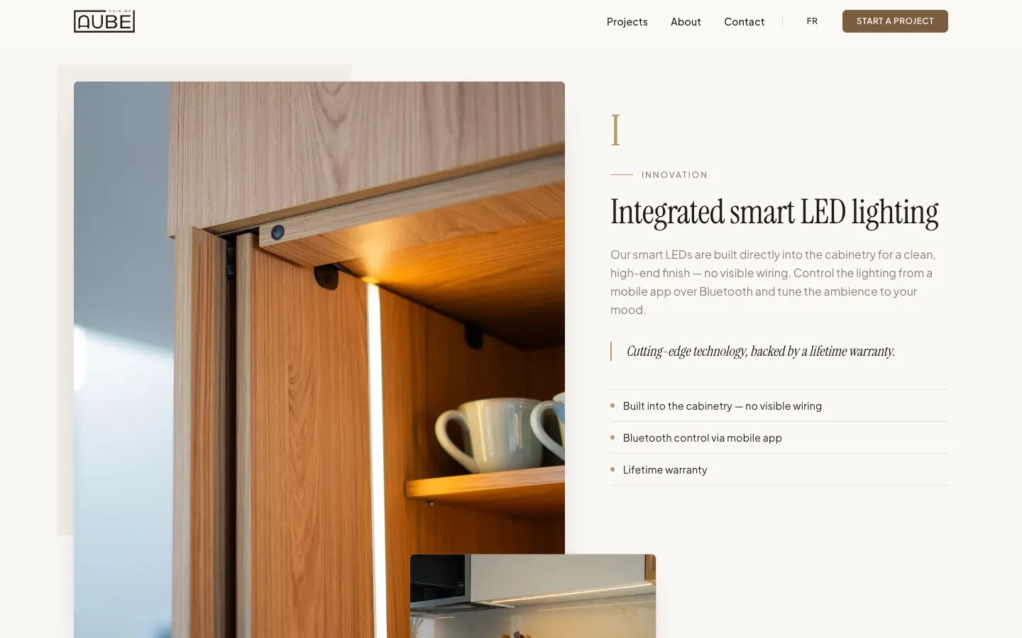 The lighting section of the Cuisine Aube site: a lit cabinet beside the heading Integrated smart LED lighting and three short benefits